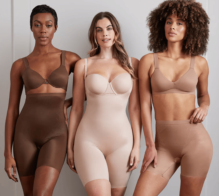 Image of women wearing Spanx with shop now button