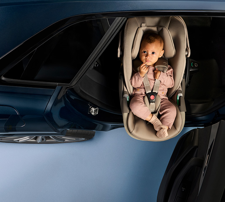 A banner showing the new Maxi-Cosi Pebble Slide Pro sliding, reclining and rotating car seat. 