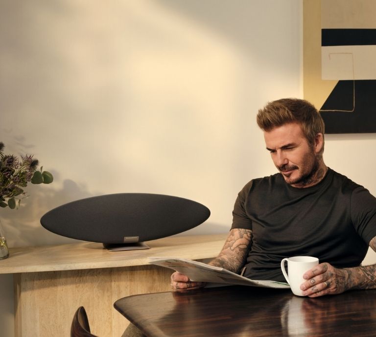 David Beckham listening to a bowers & Wilkins Zeppelin Pro wireless speaker