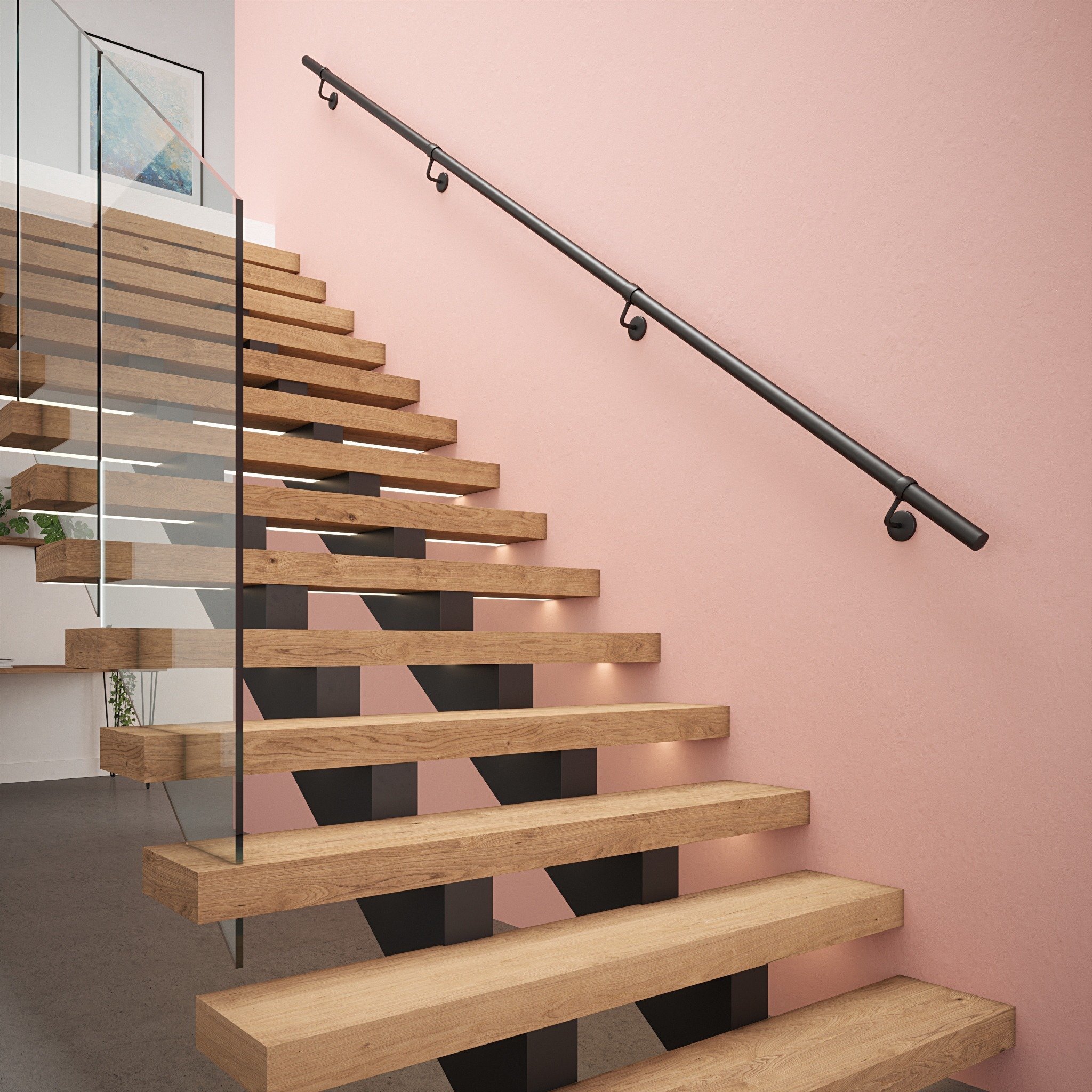 Modern open-tread wooden staircase with black metal supports and a matt black Rothley handrail mounted to a pink wall