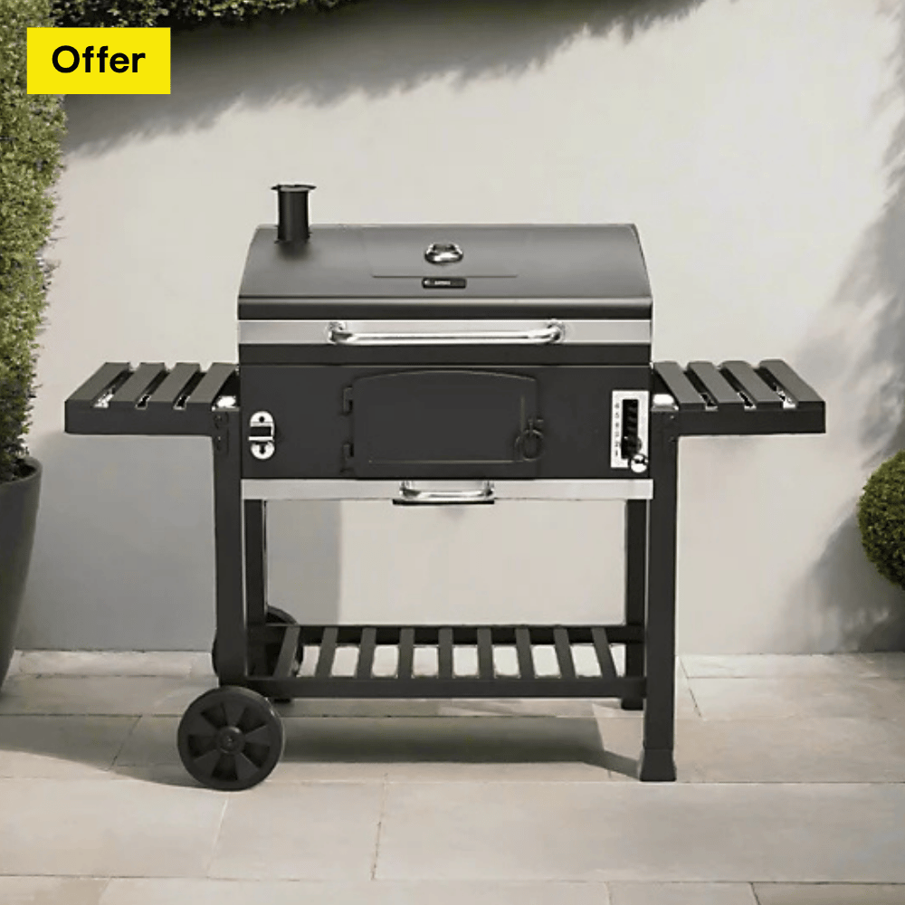 Image of a large black charcoal BBQ with side shelves and a storage shelf at the bottom