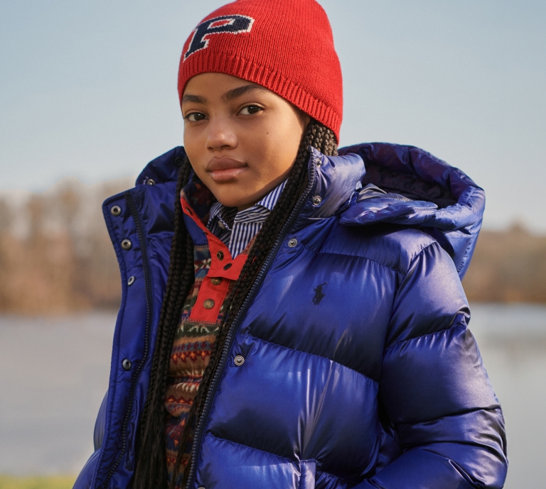 Image of young girl dressed in polo kids clothing