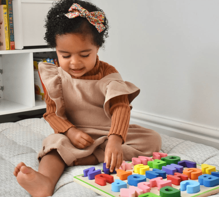 child playing with toys