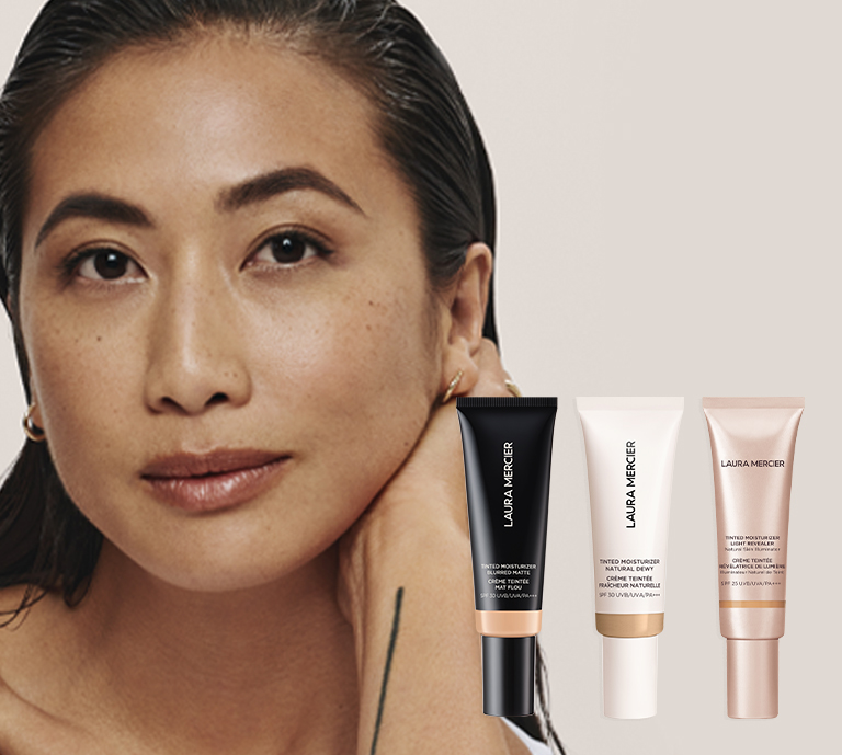 Banner advertisement for Laura Mercier feature a lady beside three Tinted Moisturisers. New Blurred Matte, Natural Dewy &amp; Light Revealer. Features a shop now button