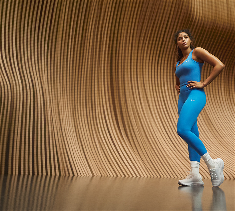 Banner ad for Under Armour showing their womenswear collection.