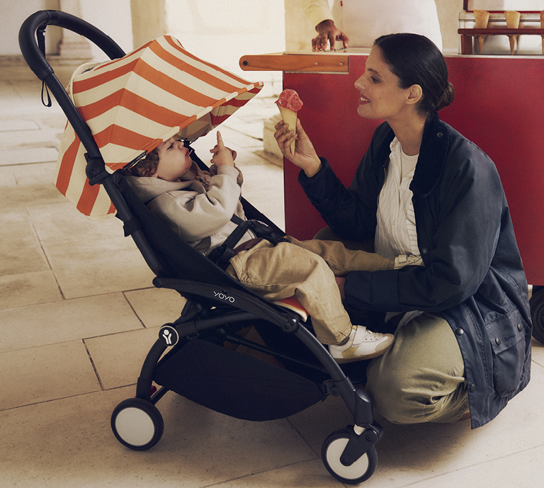 woman pushing stroller 