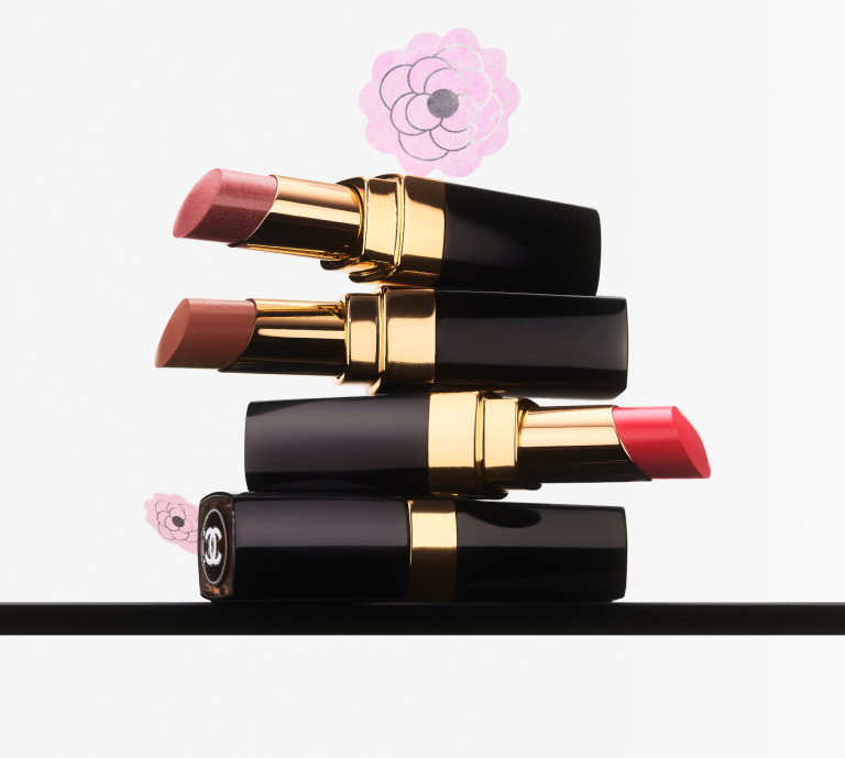 Image of Chanel lip products on floral background