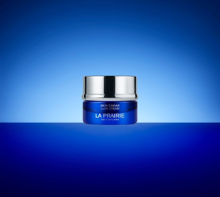 banner advertisement for la prairie and call to action button