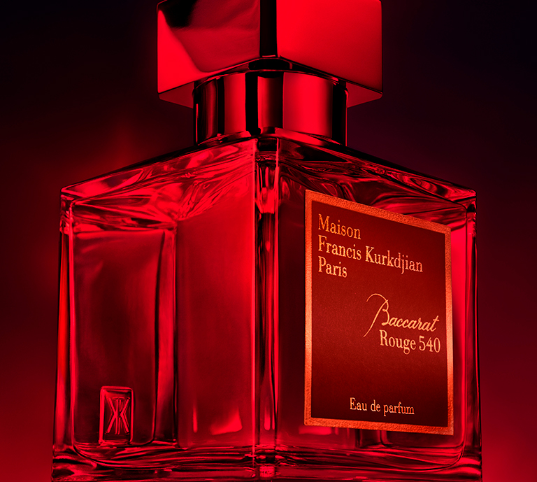 Maison Francis Kurkdjian Baccarat Rouge 540 70ml Bottle, red background.