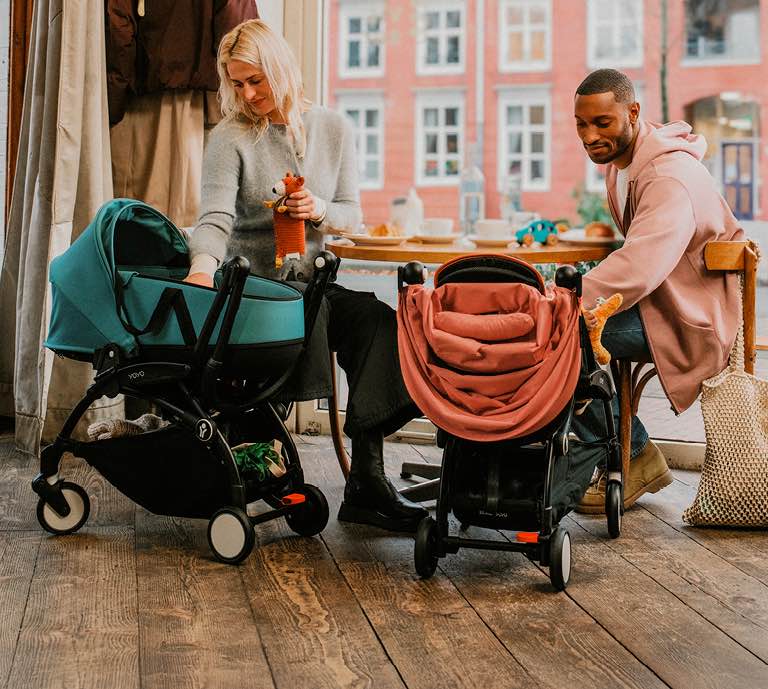 woman pushing stroller 