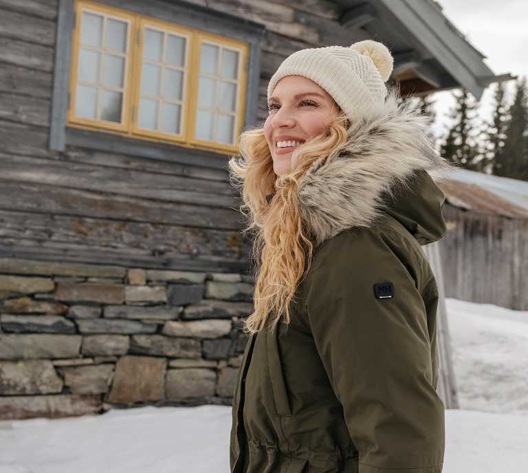 women in green jacket